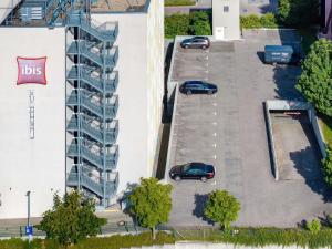 an overhead view of a parking lot next to a building at ibis Stuttgart Airport Messe in Leinfelden-Echterdingen