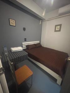 Postel nebo postele na pokoji v ubytování Capricorn hostel Yaowarat