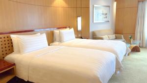 Makati Shangri-La, Manila客房内的一张或多张床位