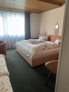 Postel nebo postele na pokoji v ubytování Hotel Eulenhof