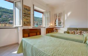 Postel nebo postele na pokoji v ubytování 2 Bedroom Cozy Apartment In Recco