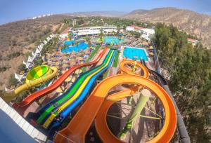 an aerial view of a water park with a water slide at LOCA BEACH in Taghazout