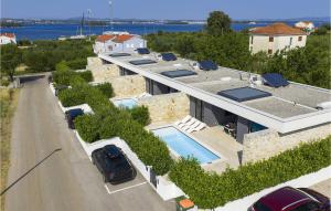 an aerial view of a house with a swimming pool at Villa K3 in Zadar