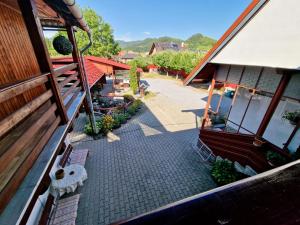 an overhead view of a patio of a building at Casa Rica Vendégház in Sovata