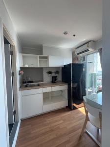 Η κουζίνα ή μικρή κουζίνα στο Minimalist Condo in Pinklao