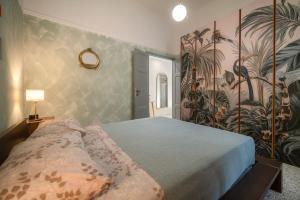 Postel nebo postele na pokoji v ubytování LaViaDelleSpezie next station 2 bedrooms AC