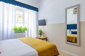 Letto o letti in una camera di Next Stop Vatican Guest House