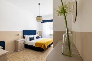 Letto o letti in una camera di Next Stop Vatican Guest House