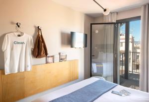 Cama ou camas em um quarto em Hotel Brummell