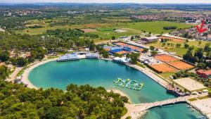 an aerial view of a harbor with boats in the water at Mari's double bedroom in Umag