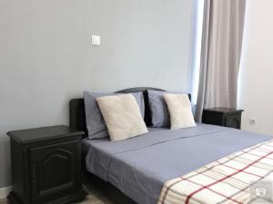 Ένα ή περισσότερα κρεβάτια σε δωμάτιο στο RentHouse Apart-Hotel Room #6