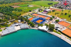 an aerial view of a stadium next to a body of water at Mari's double bedroom in Umag +19 photos