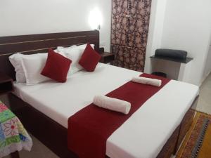 Hotel Samudra Tara客房内的一张或多张床位