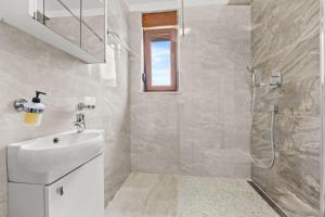 Kúpeľňa v ubytovaní Villa Markulin
