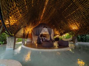Bazén v ubytování Bamboo Zanzibar nebo v jeho okolí