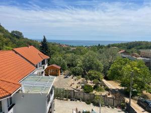 an aerial view of a house with an orange roof at Apartment Siana in Balchik
