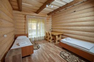 Postel nebo postele na pokoji v ubytování Chudodievo in Chynadievo Mini-Hotel + 37 fotografií