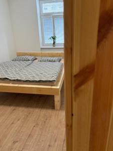 Postel nebo postele na pokoji v ubytování Apartmán Bellevie