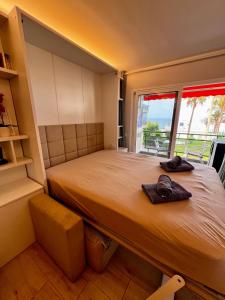 Postel nebo postele na pokoji v ubytování Studio ocean coast Los Cristianos Comodoro + 56 fotografií