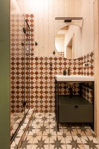 a bathroom with a sink and a shower at Chata Wędrowca - całoroczny dom Komfort in Wetlina +34 photos