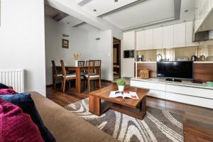 Η κουζίνα ή μικρή κουζίνα στο Apartamenty Sienkiewicza Centrum Zakopane