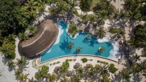 an overhead view of a pool at a resort at Six Senses Kanuhura in Lhaviyani Atoll +114 photos
