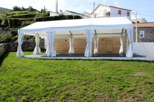a tent for a wedding in a field at Aldeia do Priolo in Nordeste