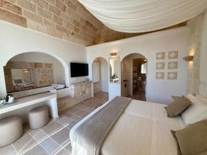 TV a/nebo společenská místnost v ubytování Vittorio Emanuele Charming Suites