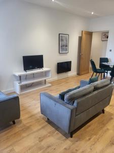Μια τηλεόραση ή/και κέντρο ψυχαγωγίας στο 3bedroom Ramsgate Getaway