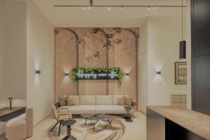salon z kanapą i stołem w obiekcie City Center Telegraph Apartment w Wiedniu