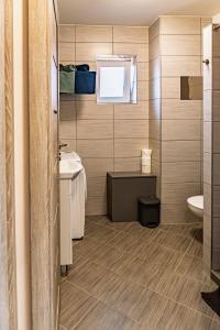 Kúpeľňa v ubytovaní Profi Kecó Apartman