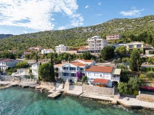 an aerial view of a town on the water at Holiday home SeVeN - Barefoot by the Sea, Velebit, Nature in Starigrad-Paklenica