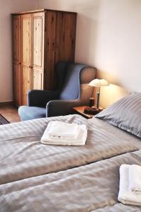 Letto o letti in una camera di Hotel Modřín