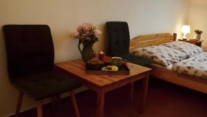 Letto o letti in una camera di Hotel Modřín