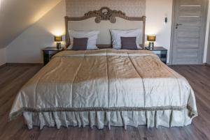 Posteľ alebo postele v izbe v ubytovaní Profi Kecó Apartman
