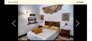 Ένα ή περισσότερα κρεβάτια σε δωμάτιο στο Casa Vacanze l'Aurora Montelparo 13 posti letto