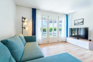 TV a/nebo společenská místnost v ubytování Chalet Wassermandli