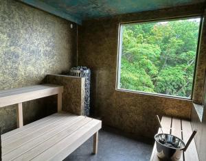 Ένα ή περισσότερα κρεβάτια σε δωμάτιο στο グラン熱川