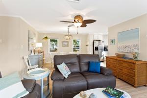 a living room with a couch and a table at 5010 - Home Sweet Helga in Avalon Bench +31 photos