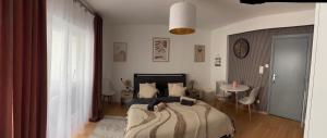 SUPERBE STUDIO a DEUX PAS DE LA PLAGE A MIDDLEKERKE 객실 침대