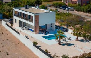 an aerial view of a house on the beach at Lovely Home In Vodice in Vodice