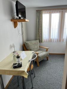 TV a/nebo společenská místnost v ubytování Hotel Aletsch