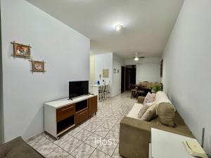 TV a/nebo společenská místnost v ubytování Ap Central com Ar Cond. e Piscina no Condomínio