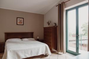 Posteľ alebo postele v izbe v ubytovaní Agriturismo Cupiglione
