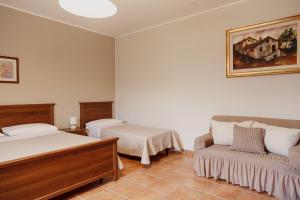 Posteľ alebo postele v izbe v ubytovaní Agriturismo Cupiglione