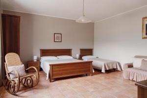 Posteľ alebo postele v izbe v ubytovaní Agriturismo Cupiglione