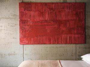 A bed or beds in a room at STRAF, Milan, a Member of Design Hotels