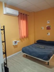 Posteľ alebo postele v izbe v ubytovaní Colors Flat