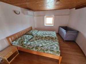 Letto o letti in una camera di U Lojzika