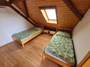 Letto o letti in una camera di U Lojzika